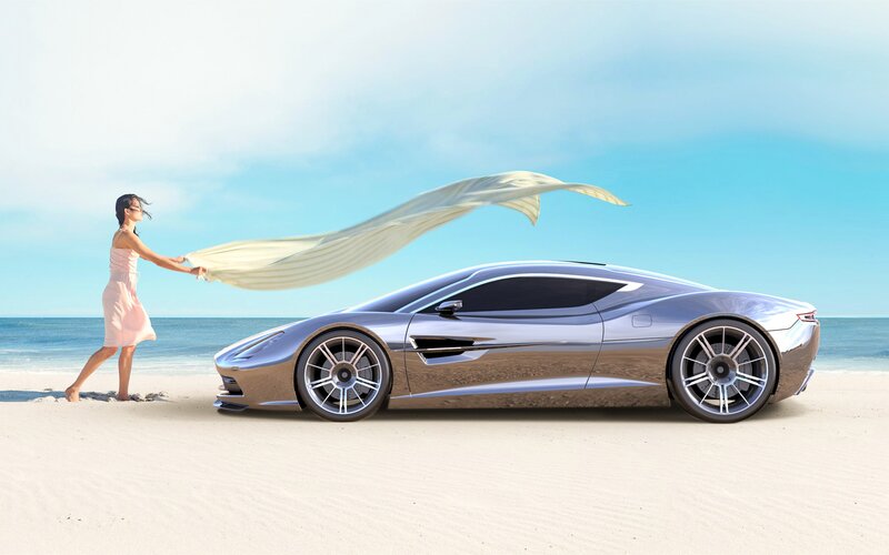 woman with car on beach