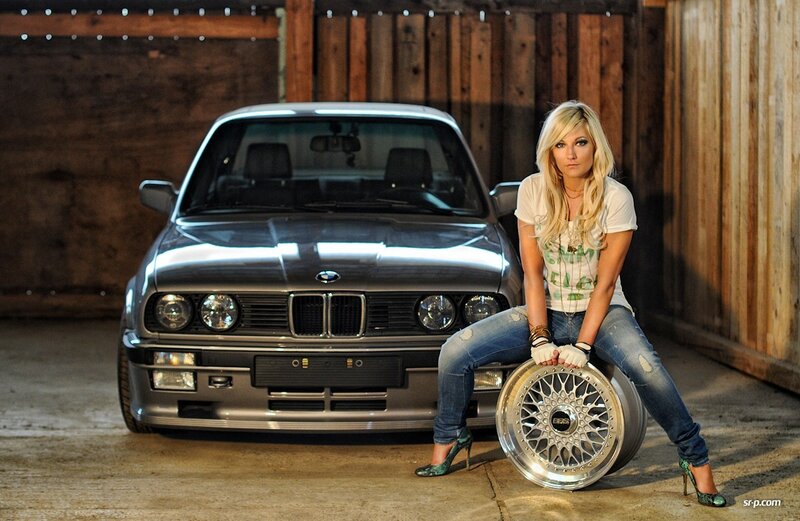 Woman with Car Wheel — Silver