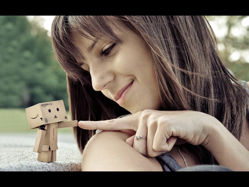woman with cardboard robot