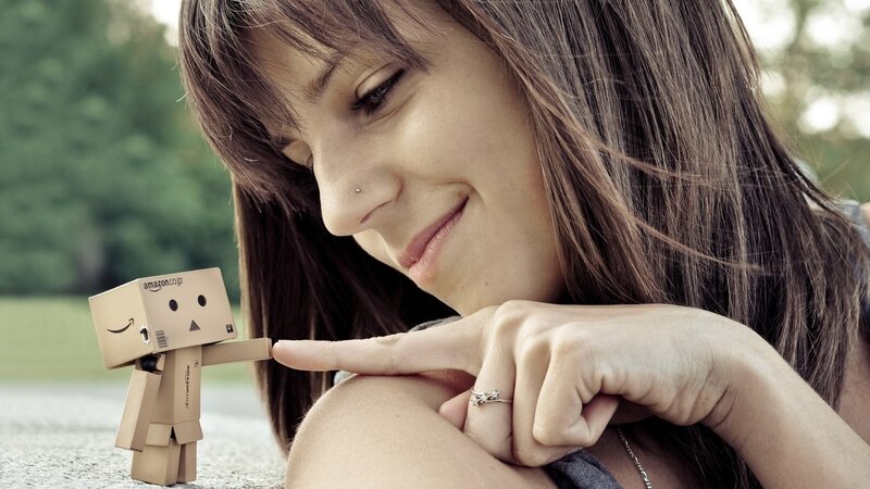 Woman with Cardboard Robot — Brown, Calm, Afternoon, Photograph, Ring