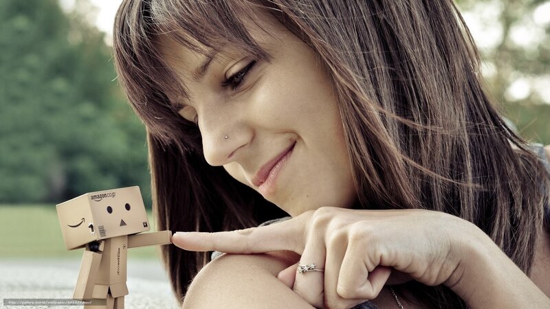 Woman with cardboard robot