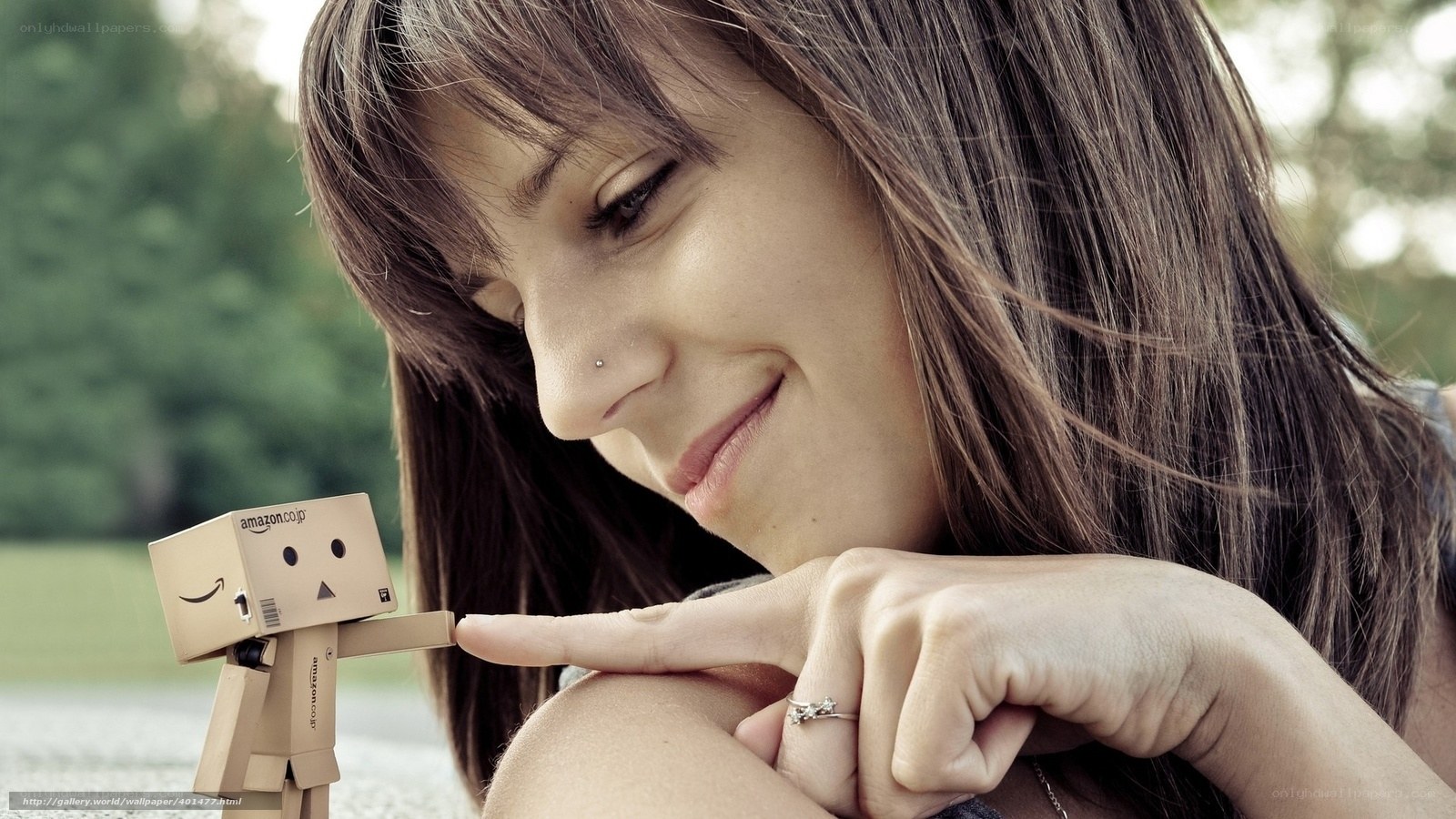Woman with cardboard robot