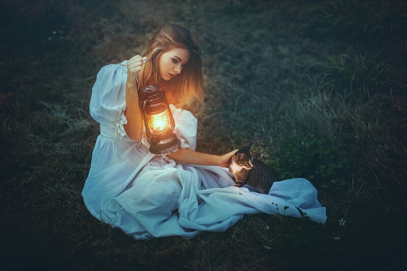 Woman with Cat and Lantern