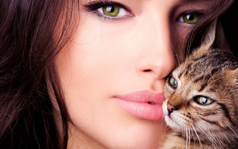 woman with cat close-up