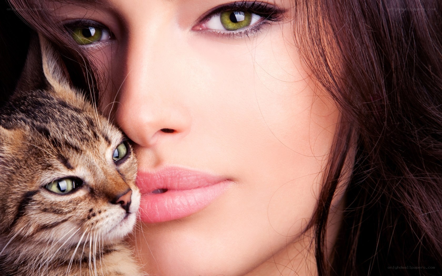 woman with cat close-up
