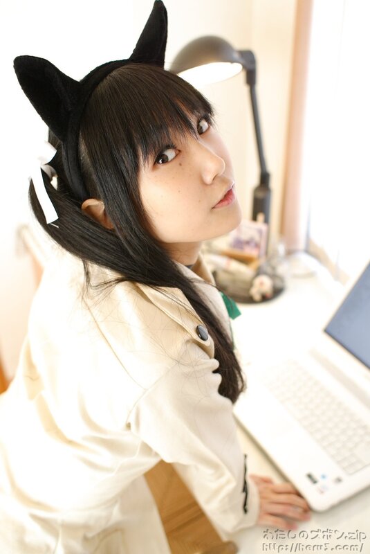 woman with cat ears at desk