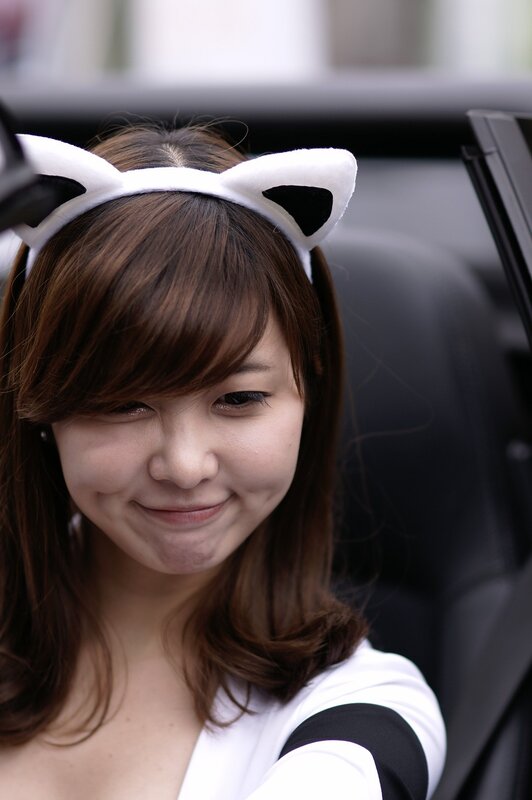 woman with cat ears headband