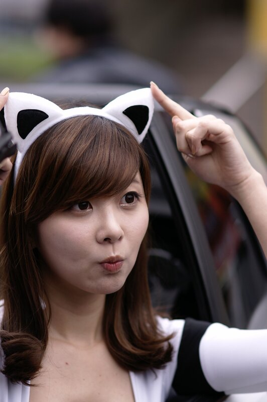 woman with cat ears headband