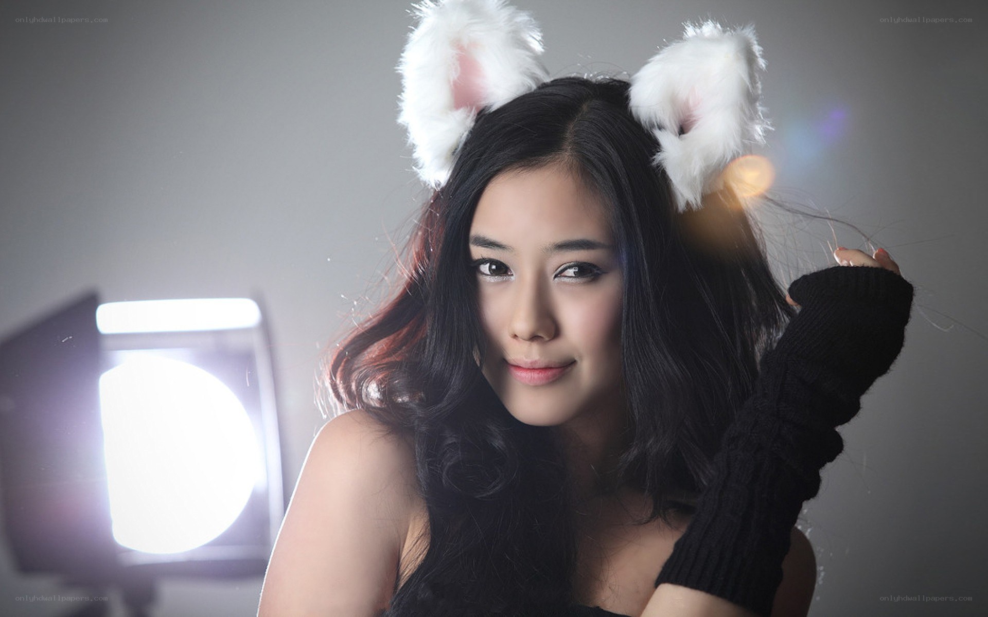 woman with cat ears in studio