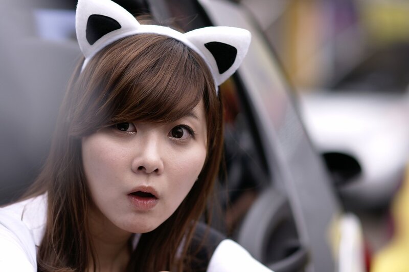 woman with cat ears looking surprised