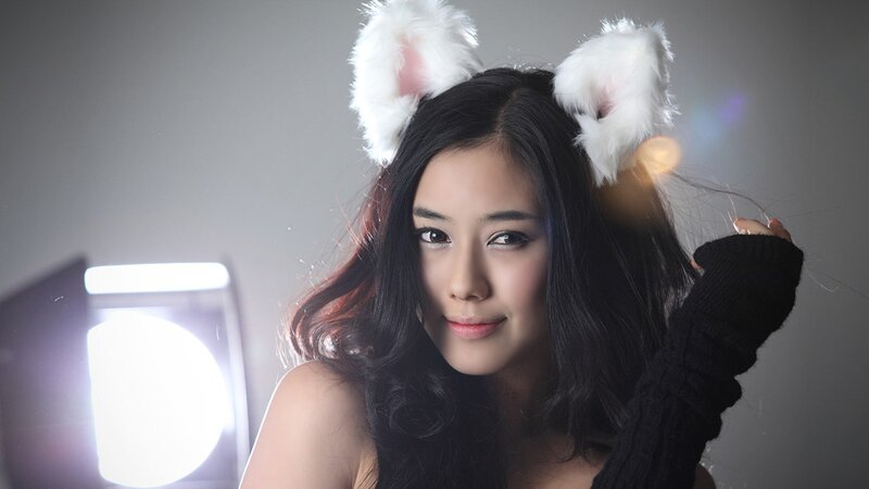 Woman with Cat Ears — White, Dramatic, Photograph