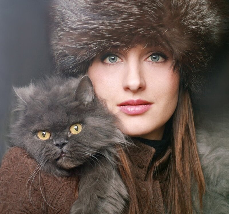 woman with cat in fur hat