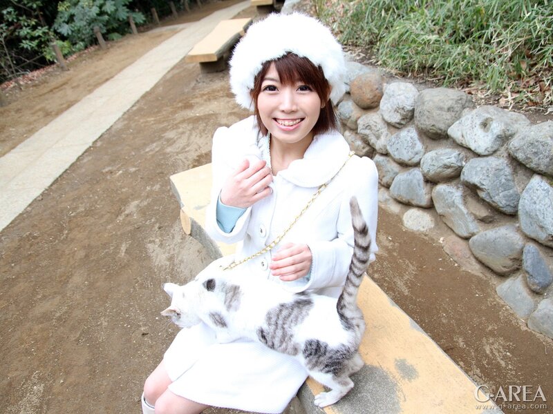 Woman with cat in park