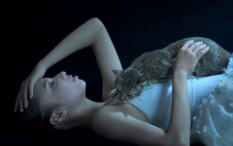 Woman with Cat Lying Down