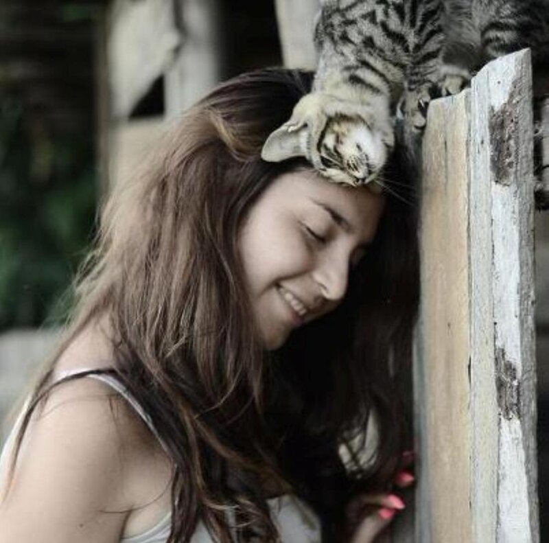 Woman with Cat on Head — Brown