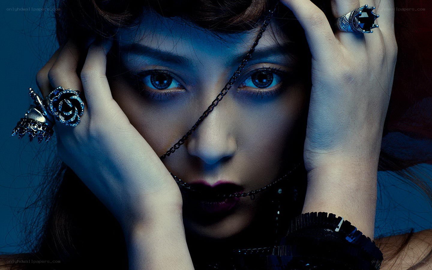 woman with chains and rings