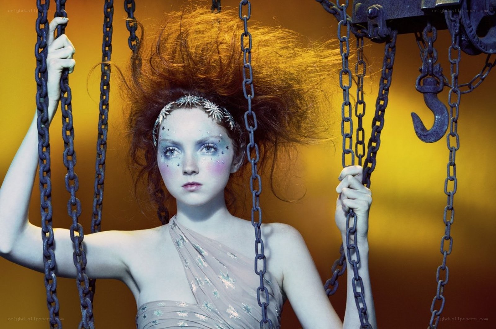 woman with chains and star makeup