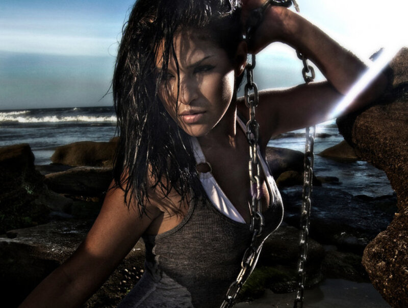 Woman with Chains on Beach