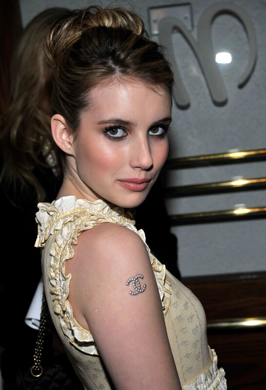 woman with chanel tattoo