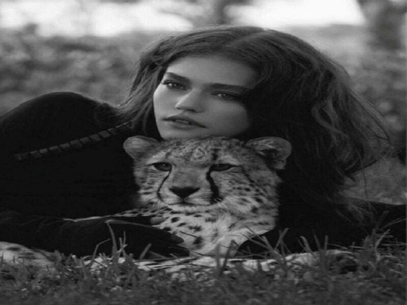 Woman with Cheetah Cub