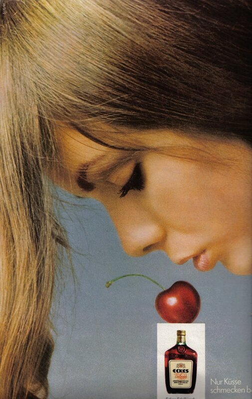 woman with cherry and bottle