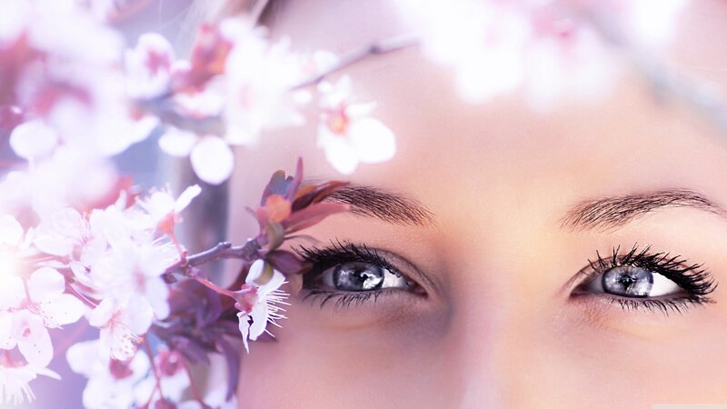 woman with cherry blossoms