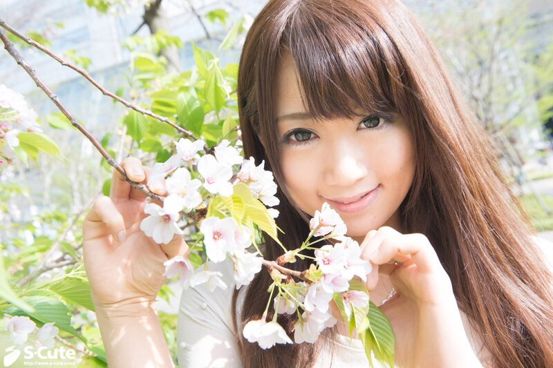 woman with cherry blossoms