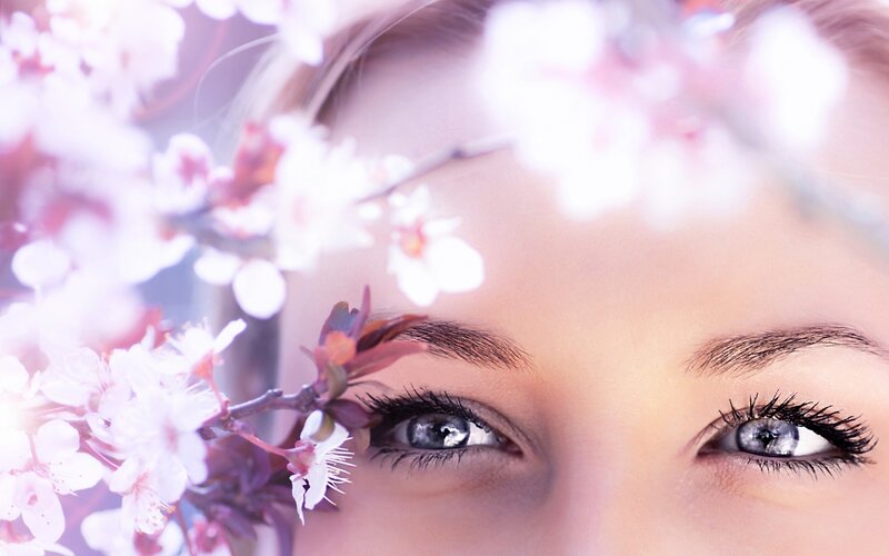 woman with cherry blossoms