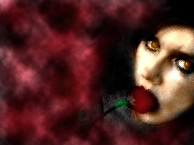 woman with cherry in mouth