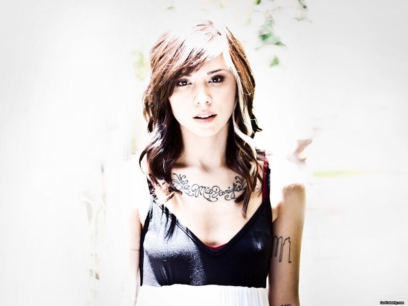 woman with chest tattoo
