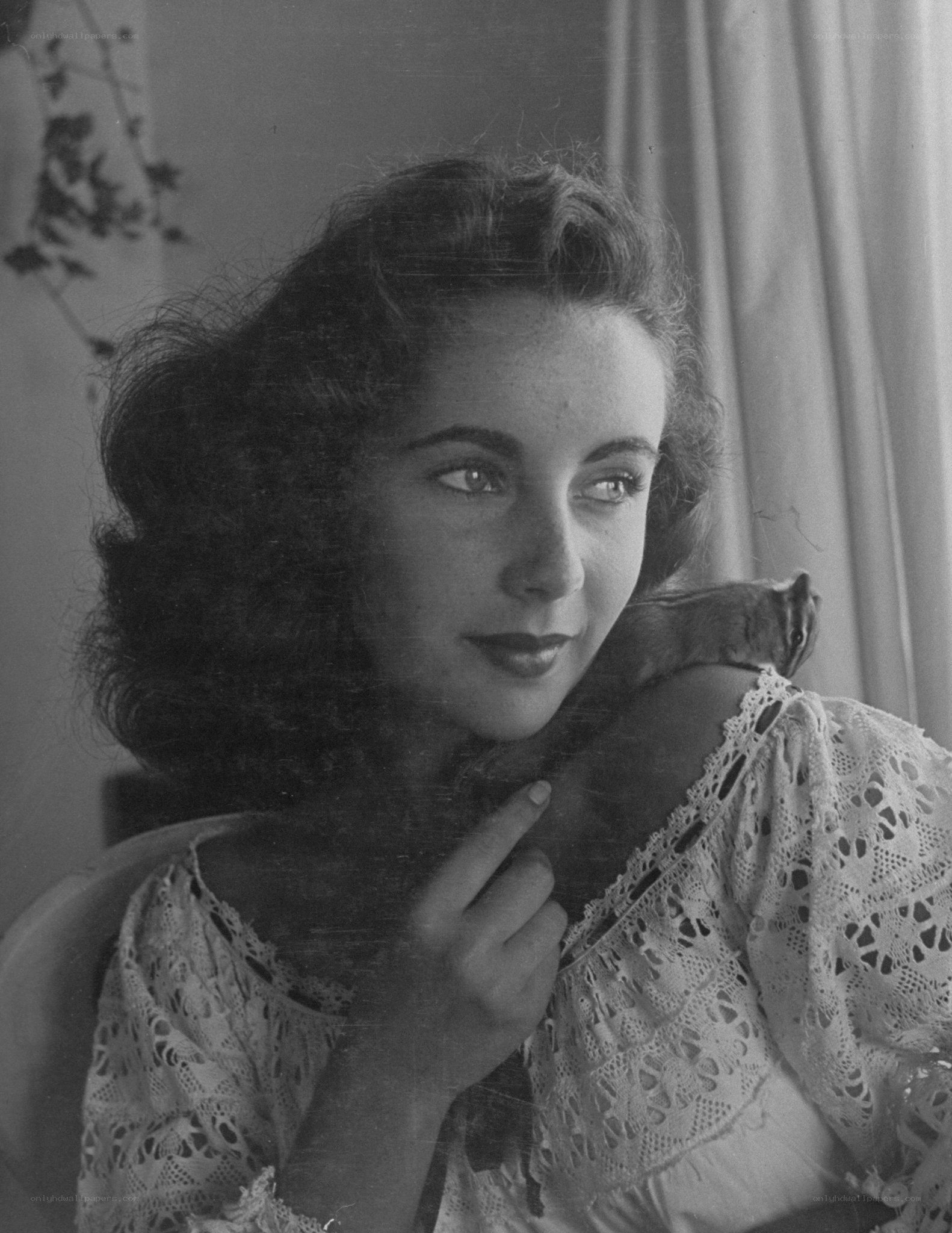 woman with chipmunk on shoulder
