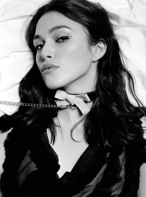 woman with choker and bow