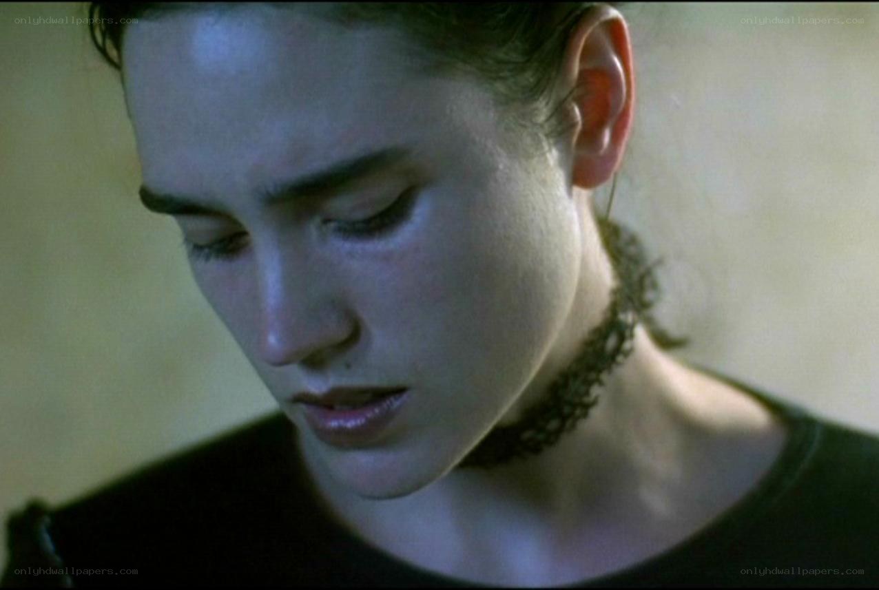 woman with choker looking down