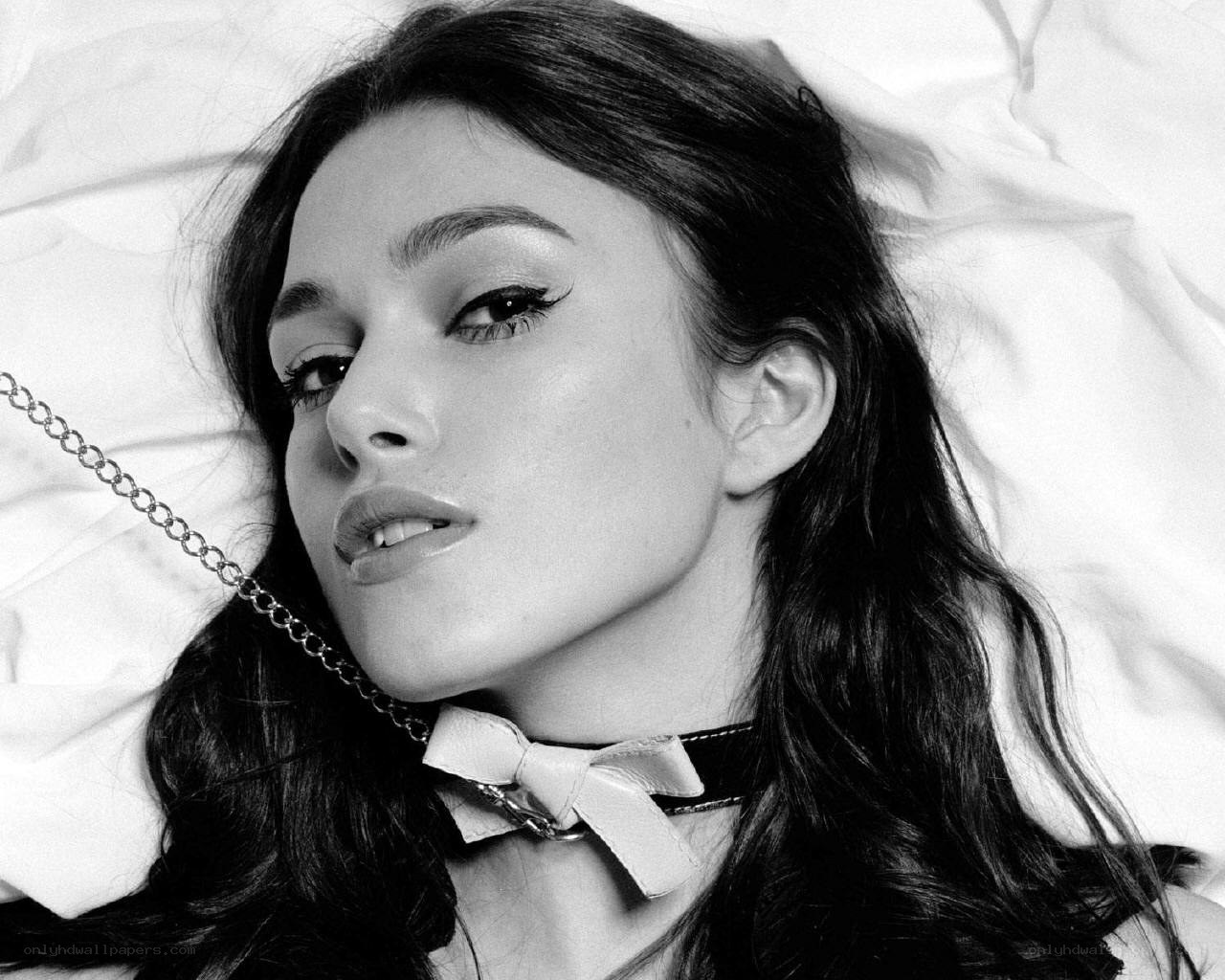 woman with choker lying down
