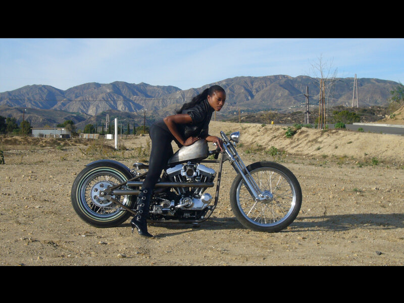 woman with chopper motorcycle