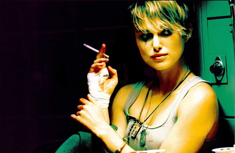 woman with cigarette and bandaged hand