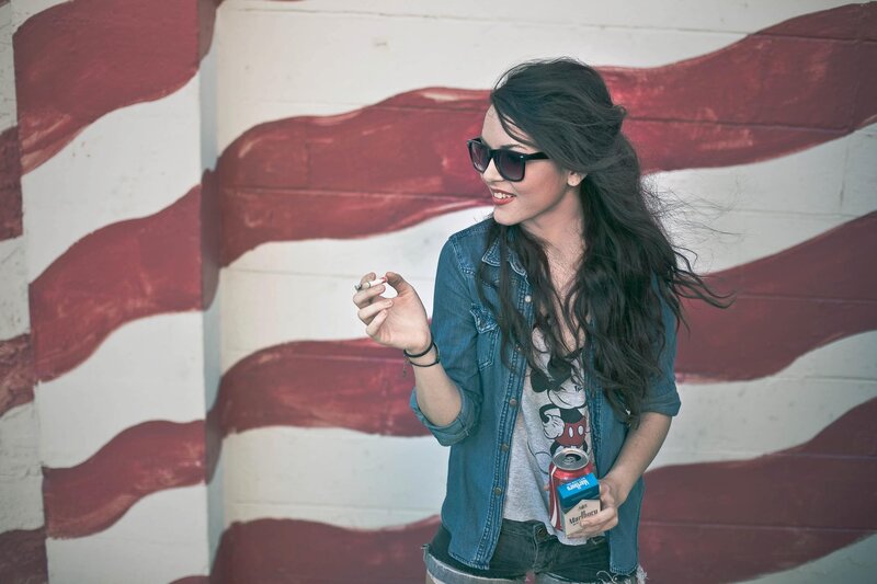 woman with cigarette and drink