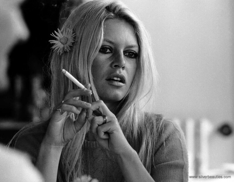 woman with cigarette and flower