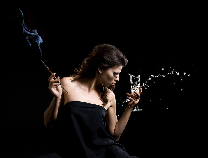 woman with cigarette and glass