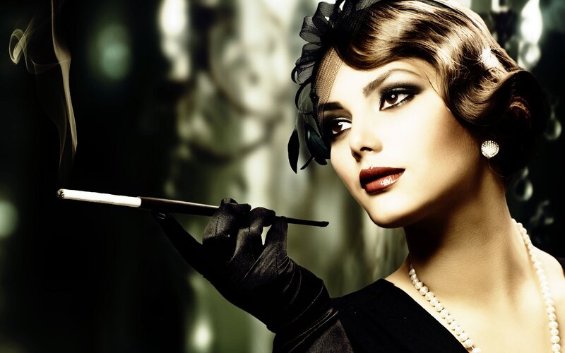 woman with cigarette and pearls