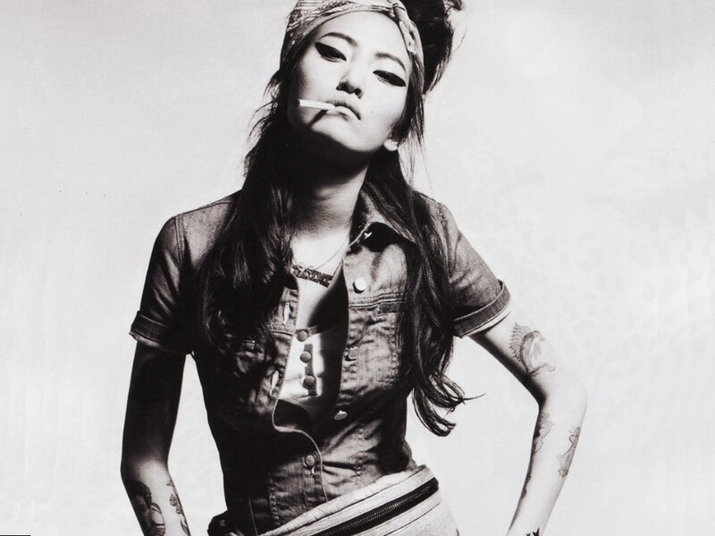 woman with cigarette and tattoos