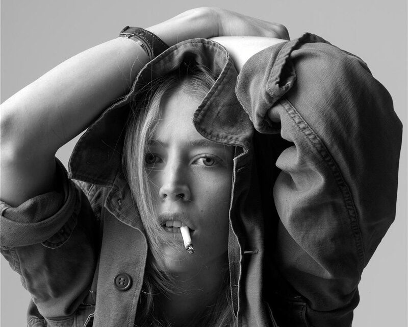 Woman with Cigarette — Black, Serious