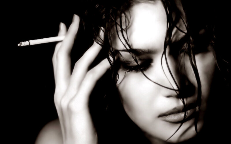 woman with cigarette in black and white
