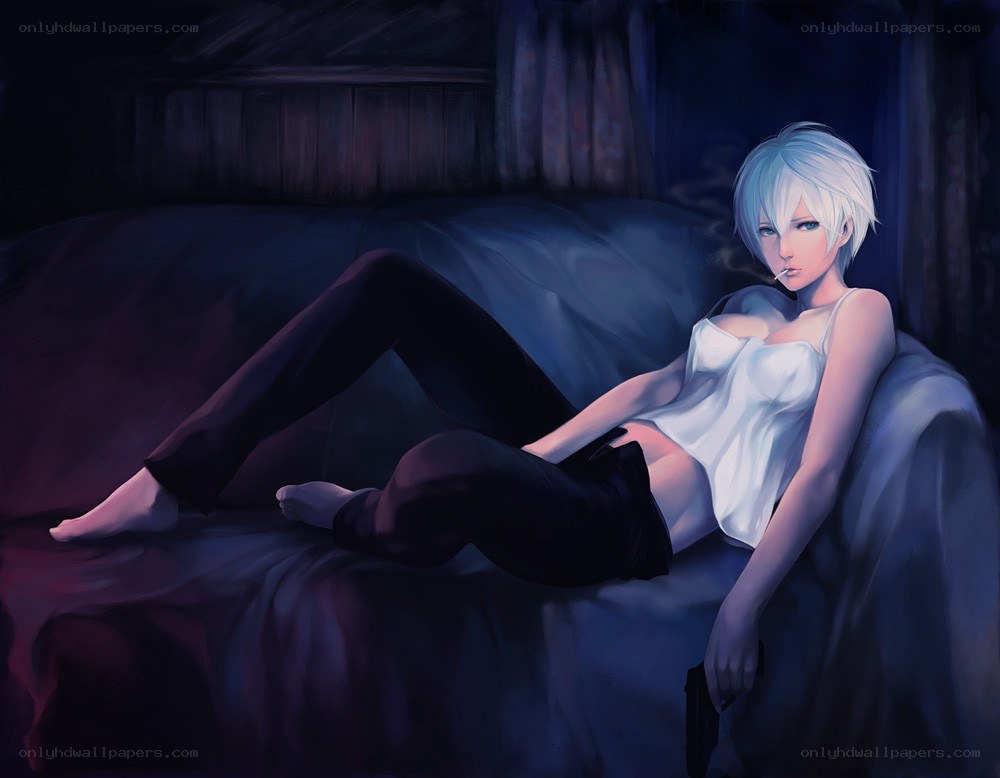 Woman with cigarette on bed