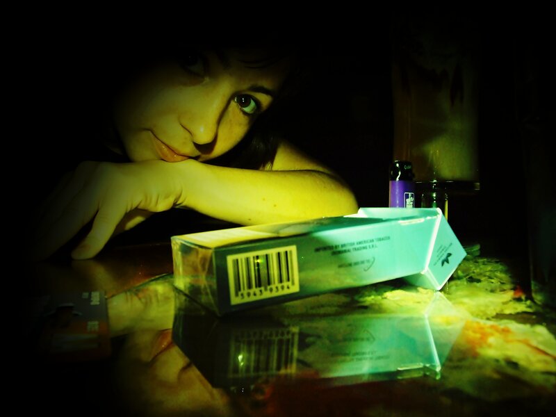 Woman with Cigarette Pack