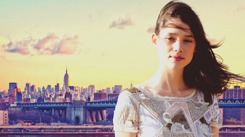 woman with city skyline background