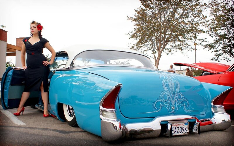 Woman with classic car