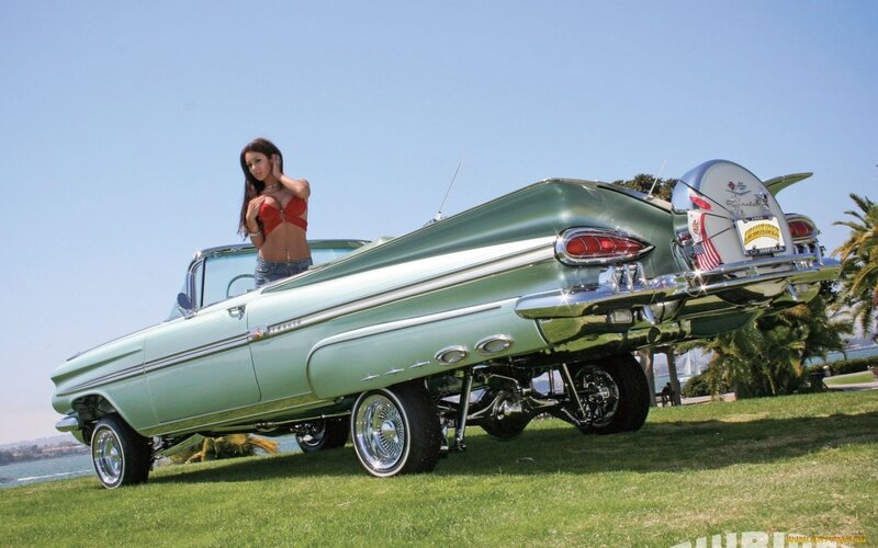 Woman with classic car