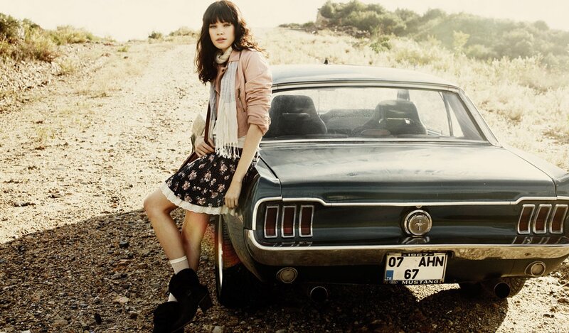 Woman with classic car