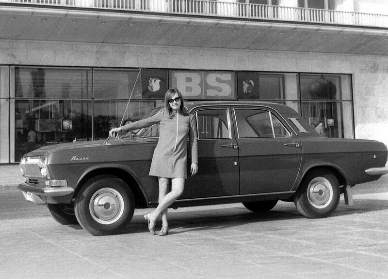Woman with classic car